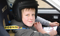 Young Lewis Redwood at the wheel of the Peugeot 106 Rallye