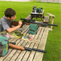 boy aiming air rifle