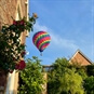Hot Air Ballooning Devon - Balloon over House