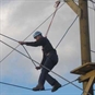 man walking a tightrope