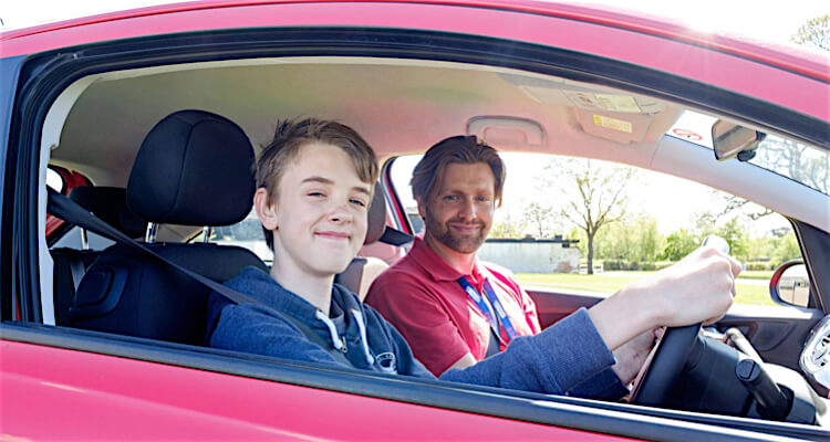 Sam drive a car for five. Sam Driving School Bellevue.