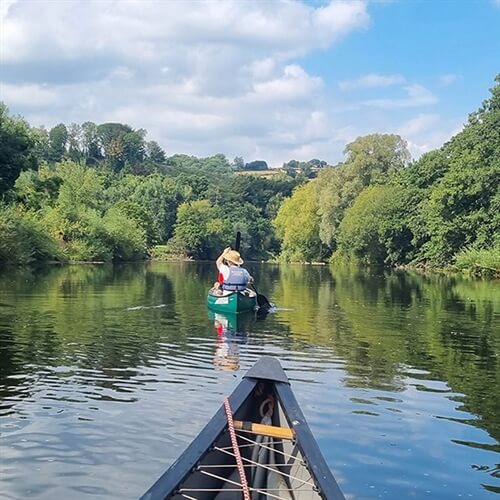 Guided Canoeing with Black Mountain Activity Centre along the river