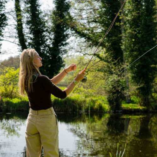 Wilde Trout Wherwell Lake Private Fishing in Hampshire - Lady Casting 