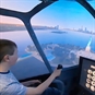 Boy with pilot hat on simulator 3
