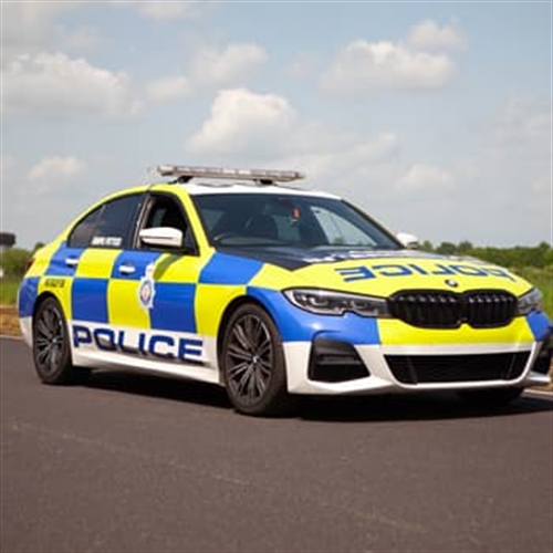 Drive a police car on a track Drive a police car on a track