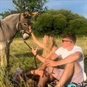 Donkey Walking Experience & Picnic in Surrey - Couple Stroking Donkey