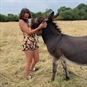 Donkey Walking Experience & Picnic in Surrey -Woman Cuddling Donkey