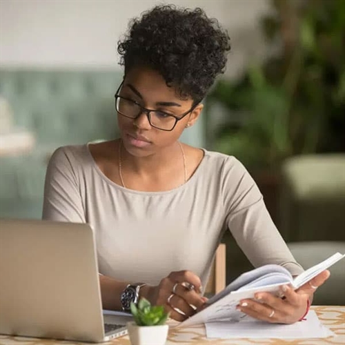 Online Poetry Writing Course - Woman Doing Poetry Course on Laptop Online Poetry Writing Course - Woman Doing Poetry Course on Laptop