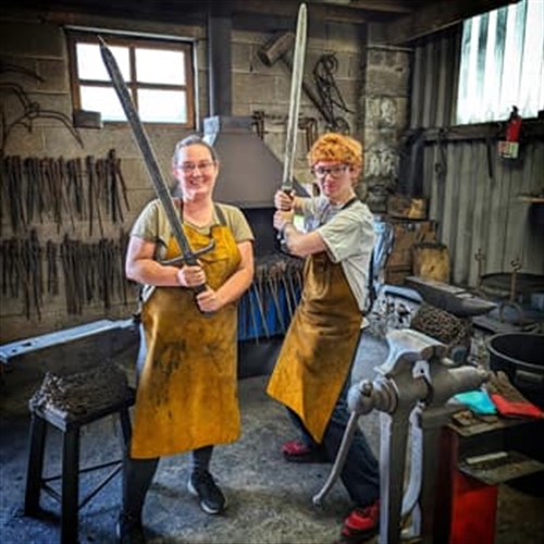 Sword Making Workshop in the Yorkshire Dales - Showing off the swords they made Sword Making Workshop in the Yorkshire Dales - Showing off the swords they made