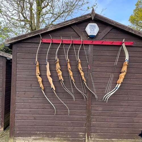 Target Archery in Bedford Bows hanging up on shed Target Archery in Bedford Bows hanging up on shed