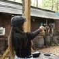 Woman Aiming Pistol at Target