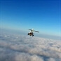 Microlight in the clouds