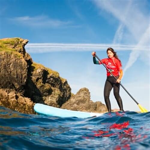 Coastal Snorkel & Paddleboard Adventure Newquay - Lady Paddleboarding