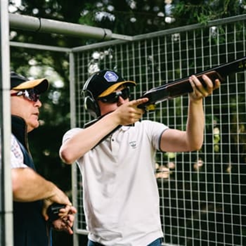 Clay Pigeon Shooting Orston - Man Aiming Gun at Clays