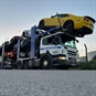 Scania Truck with cars on trailer