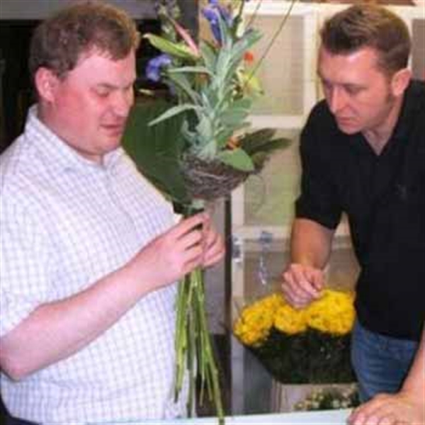 men enjoying flower arranging