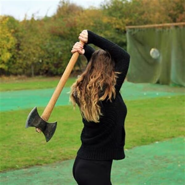 woman throwing an axe