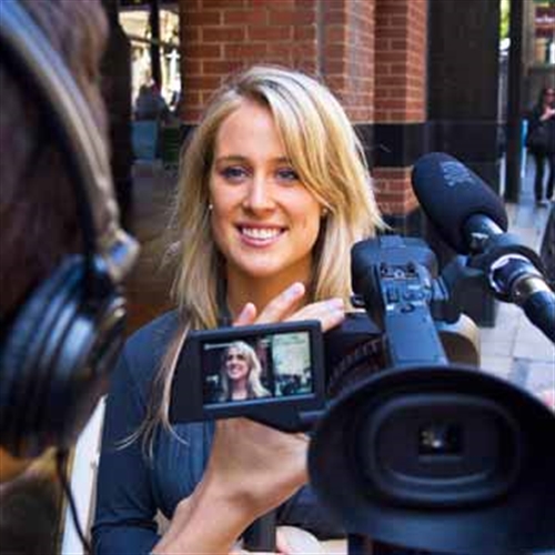 lady presenting to camera
