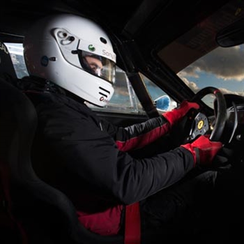 Man driving racing car Man driving racing car