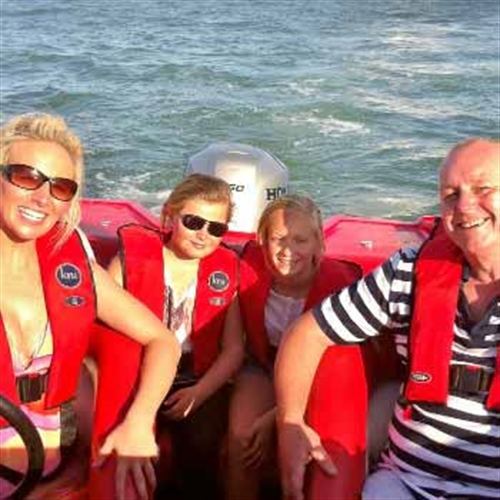 family on powerboat family on powerboat