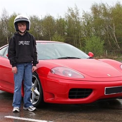 boy with red Ferrari boy with red Ferrari