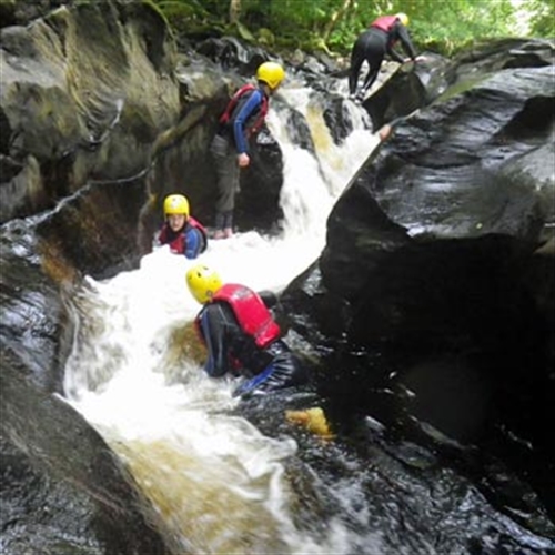 abseiling down a canyon abseiling down a canyon
