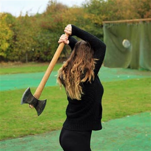 woman throwing an axe woman throwing an axe