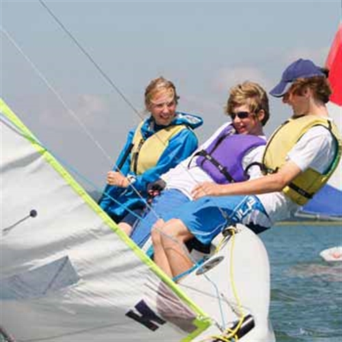 3 teenagers enjoying a sailing day 3 teenagers enjoying a sailing day