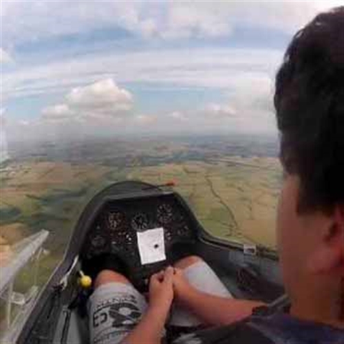 boy sitting in glider boy sitting in glider
