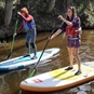 women paddleboarding