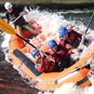 People falling out of raft
